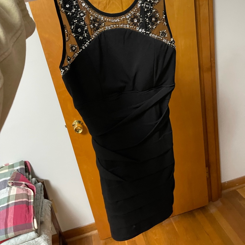 Black beaded body on dress